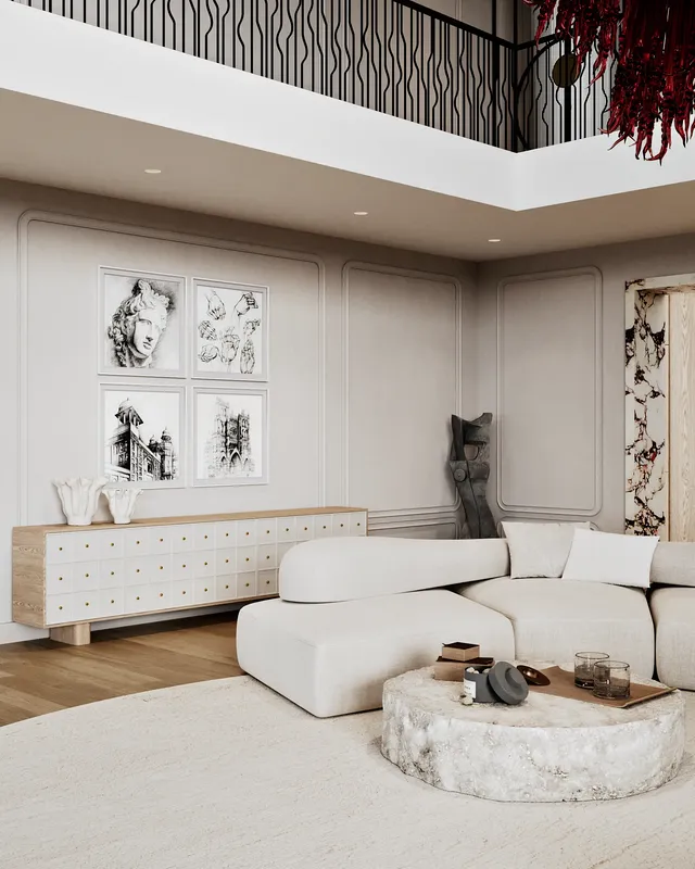 Vignette de salon élégante avec un buffet moderne pour le rangement et une vue partielle sur le canapé.