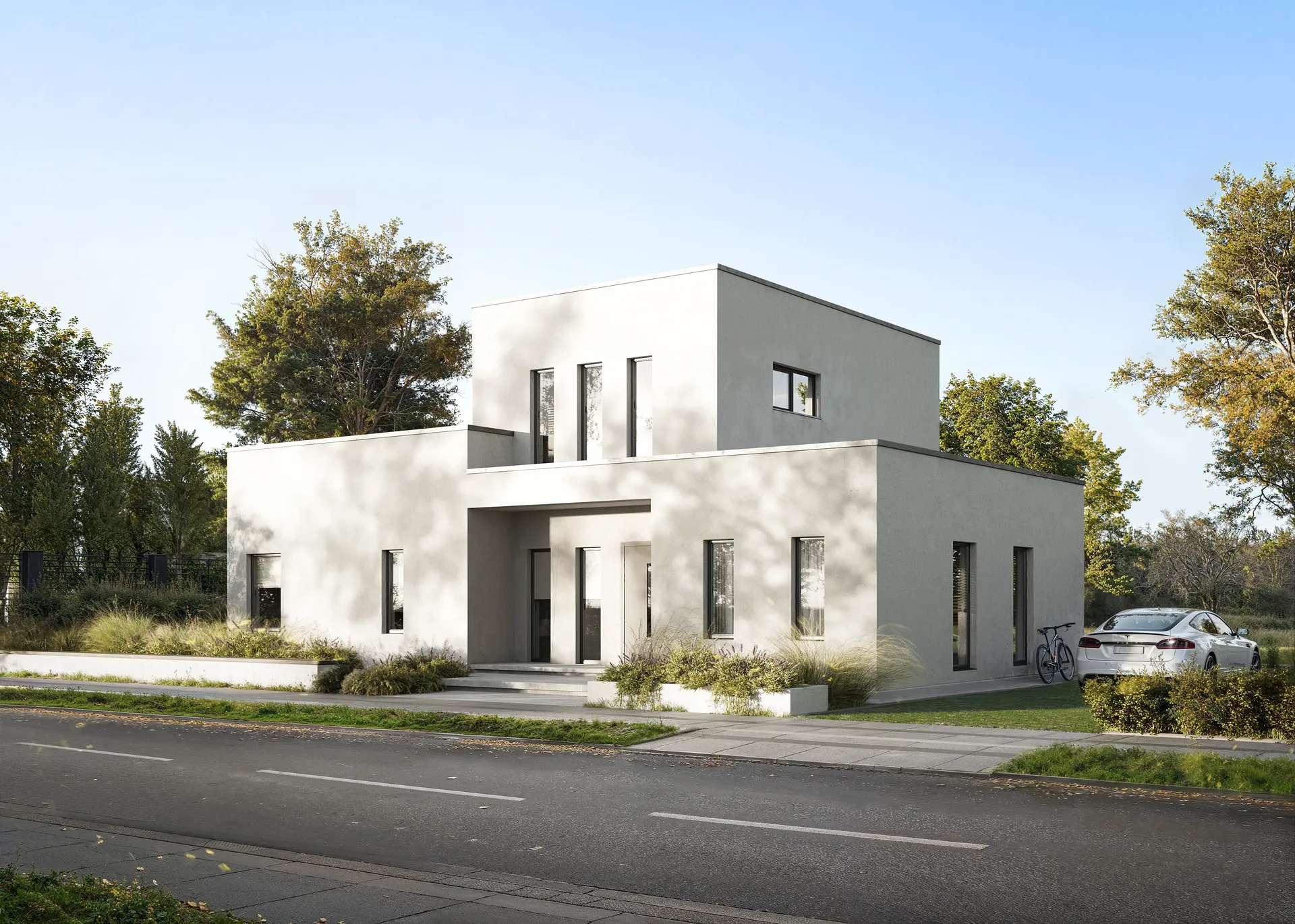 Schrägansicht der Fassade und des Eingangs mit geparktem Auto.