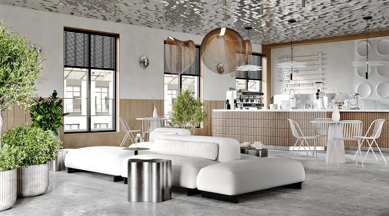 Helles Café-Interieur mit Bar, Esstischen und einer bequemen Sofagruppe.