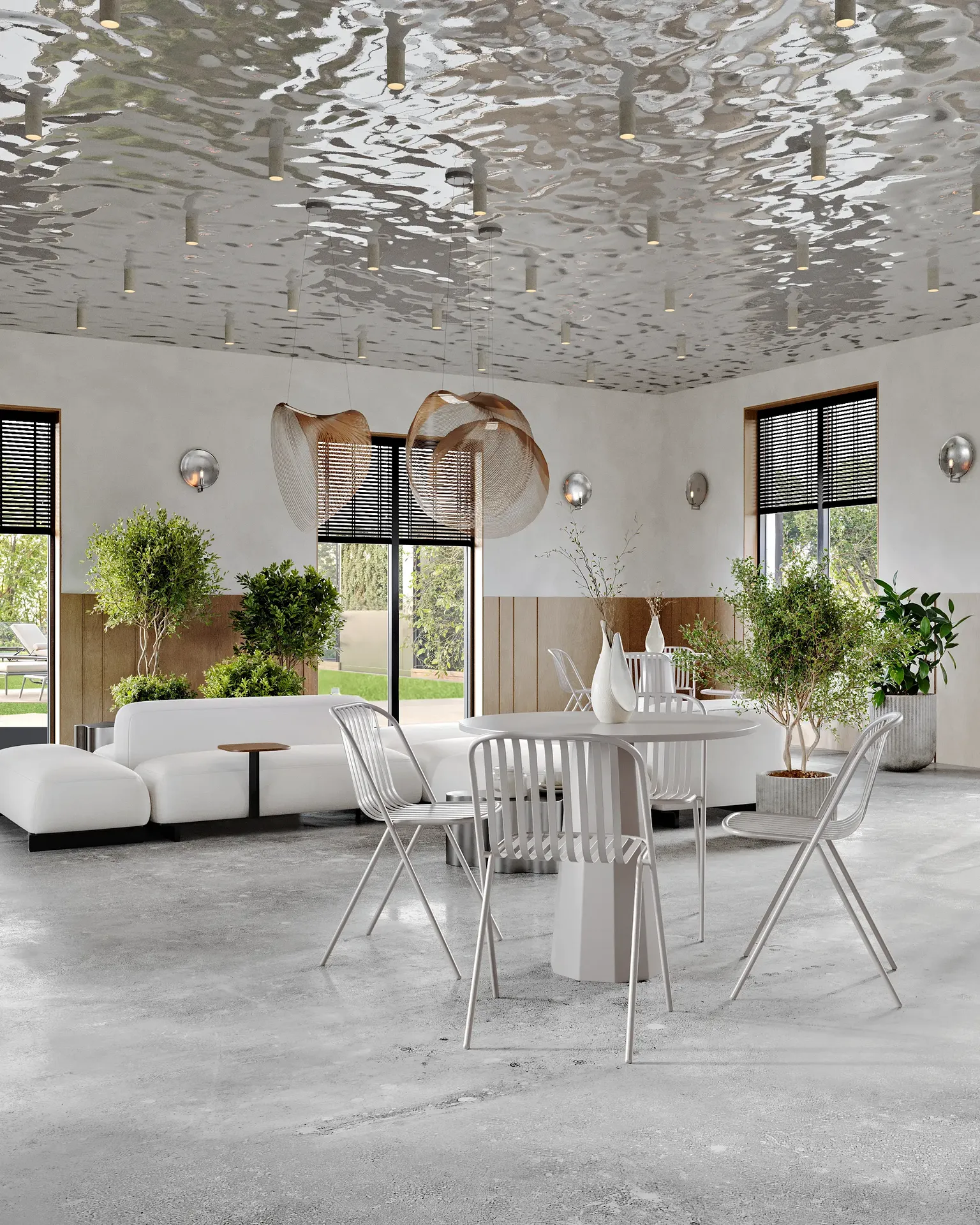 Espace repas café comprenant une table de fenêtre pour quatre personnes et un canapé-salon séparé.