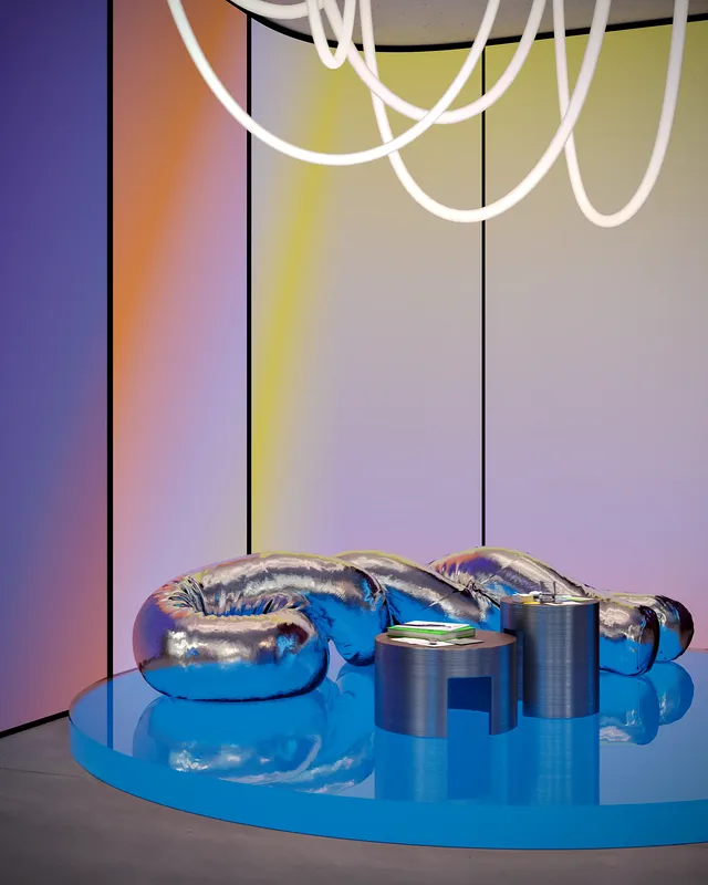 Gemütliche Wartelounge mit modernem Sofa und zentralem Couchtisch.