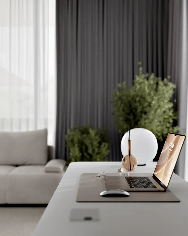 Gros plan sur un décor élégant et minimaliste disposé sur le bureau moderne de la chambre.