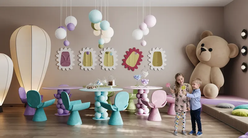 Espace repas et fête festif dans un centre pour enfants, décoré pour l'anniversaire d'un enfant.