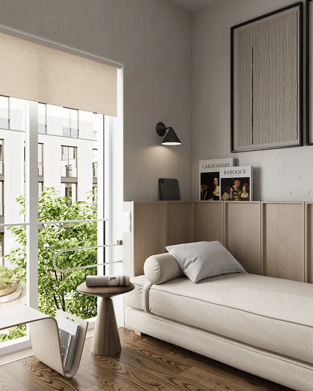 Schrägansicht eines Schlafbereichs mit Couchtisch und Arbeitsbereich.