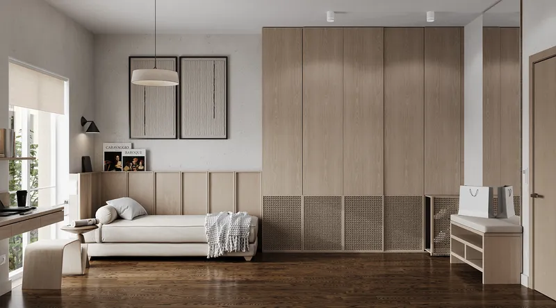 Blick auf einen Schlaf- und Garderobenbereich mit barrierefreien Handläufen.