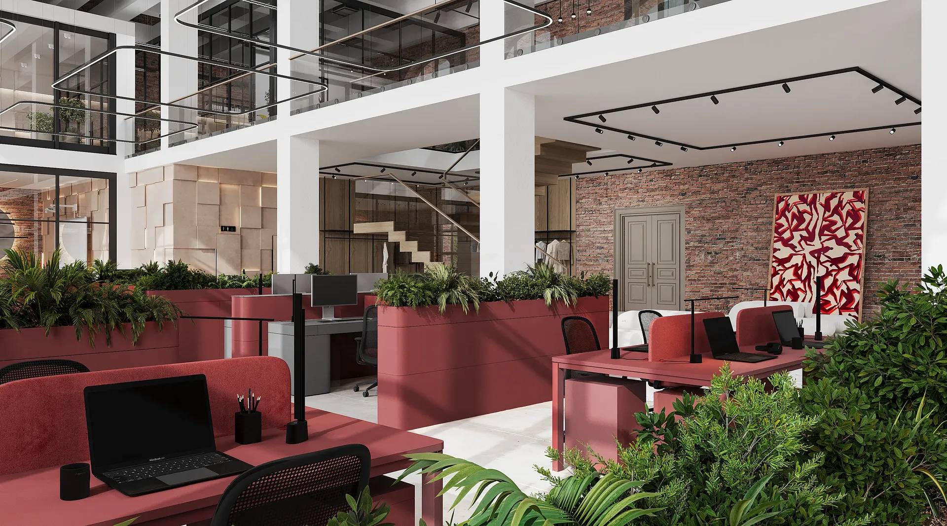 Detailed view of a modern workstation and equipment in a bright, two-story open office.