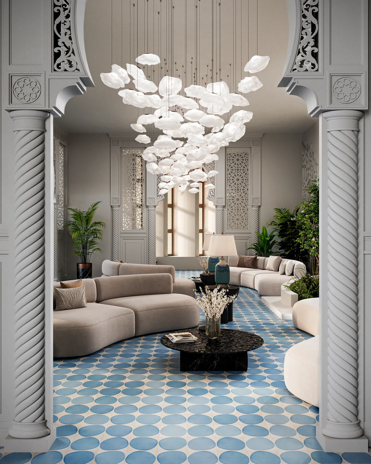 View from an archway into a lobby with sofas and tables.