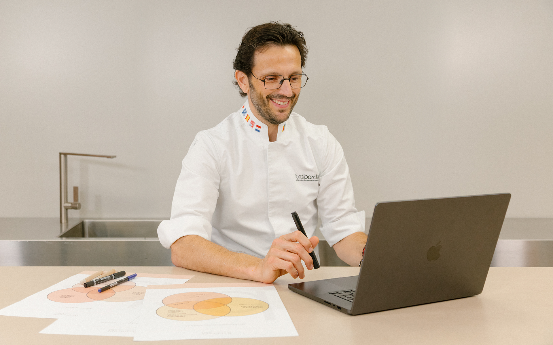 Jordi Bordas working on his laptop
