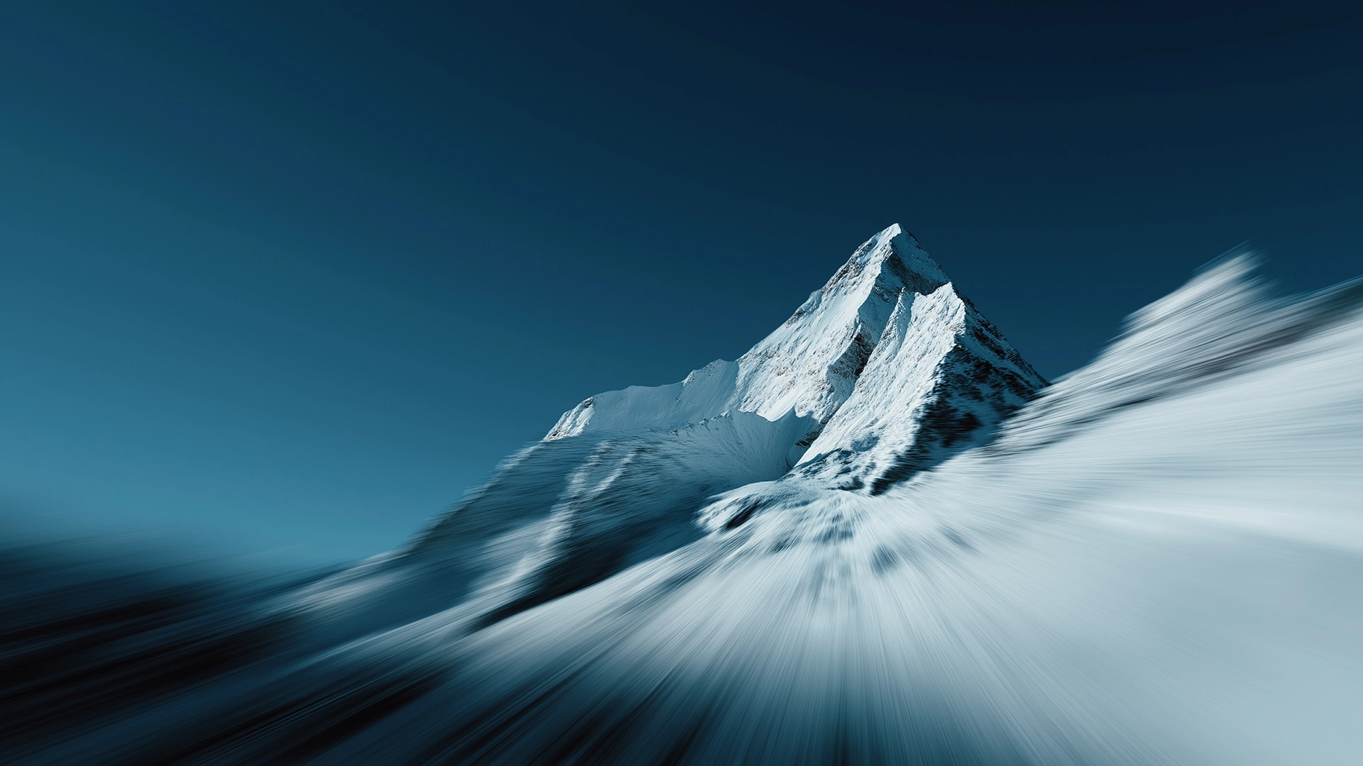 Blue skies and a subtle sunlight. In the distance there's a snow-filled mountain. Motion blur effect on the sides which creates a dynamic effect.
