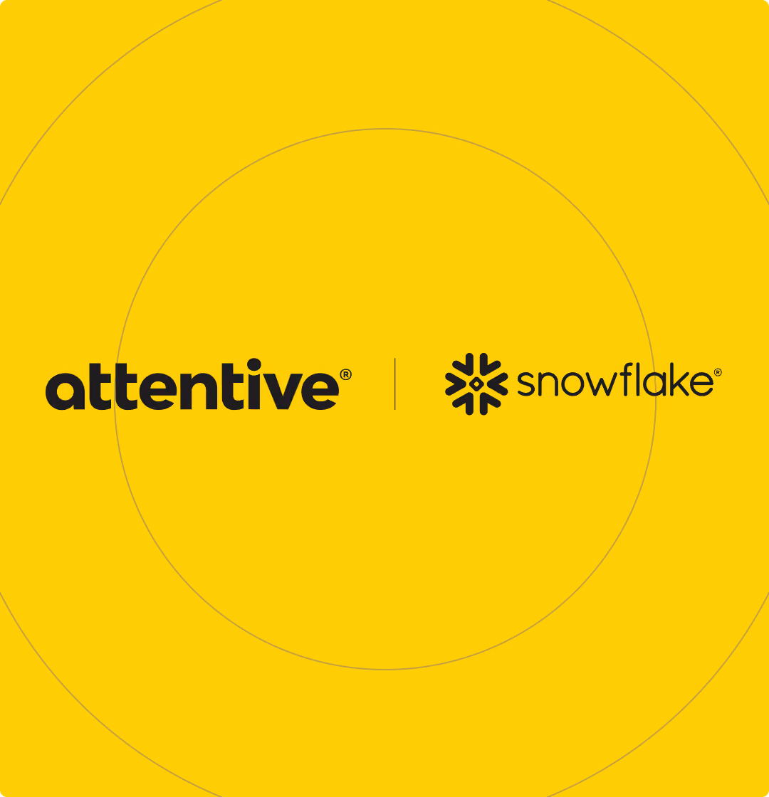 Logos of attentive and snowflake brands side by side on a yellow background.