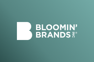 Logo Bloomin’ Brands en blanc sur fond dégradé Marigold