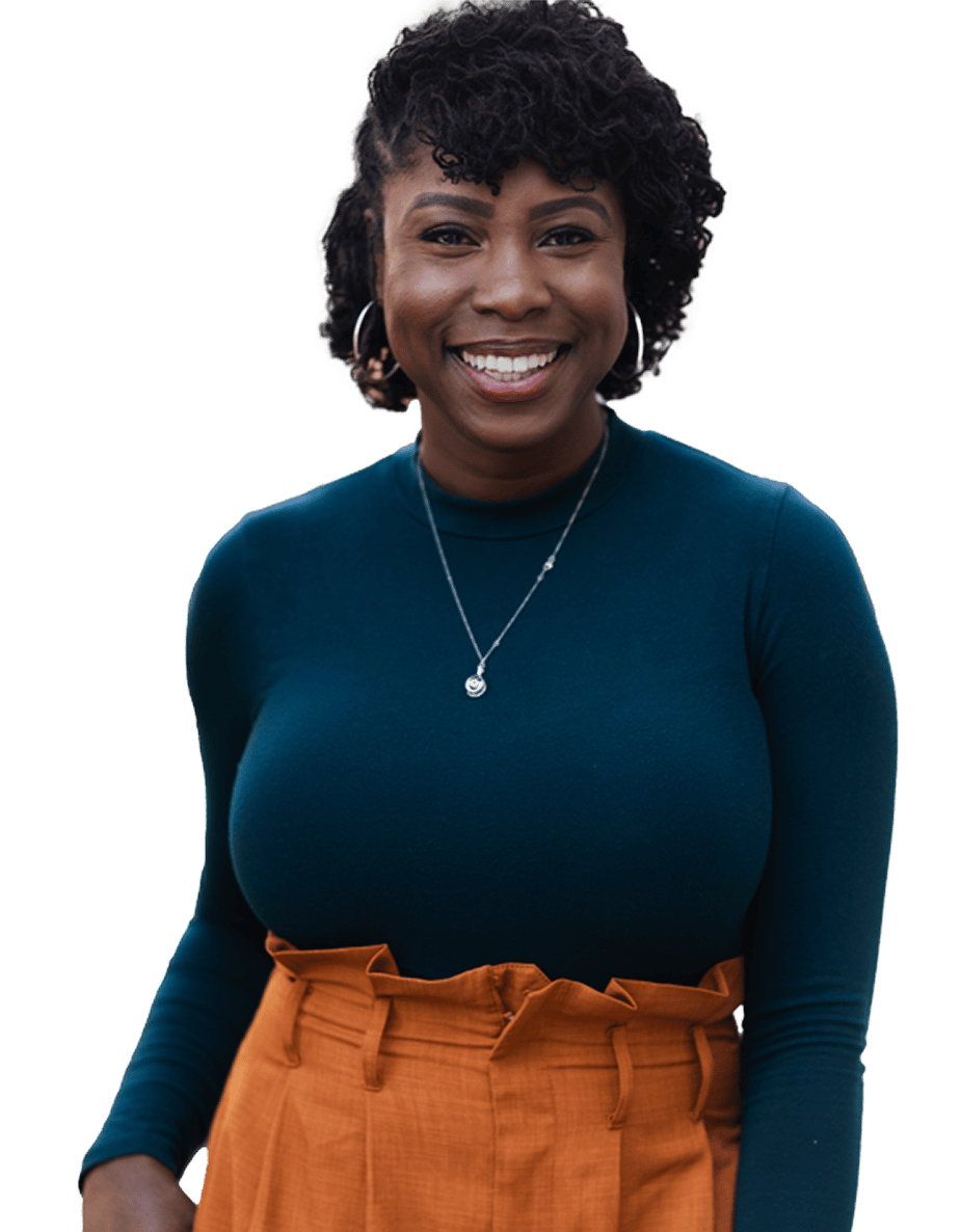 Smiling woman in teal top and orange pants against white background