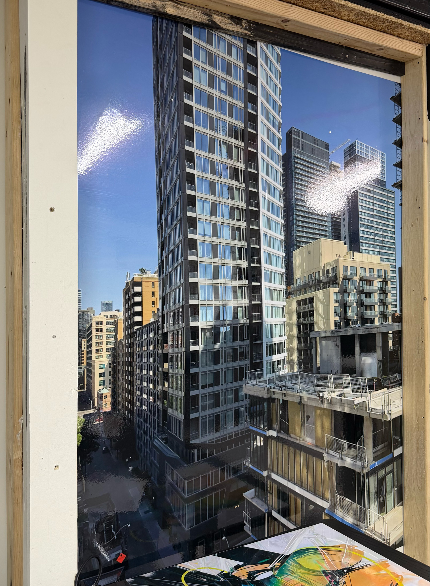 [background image] shelves filled with frames and sunglasses for an optician store and optometry clinic