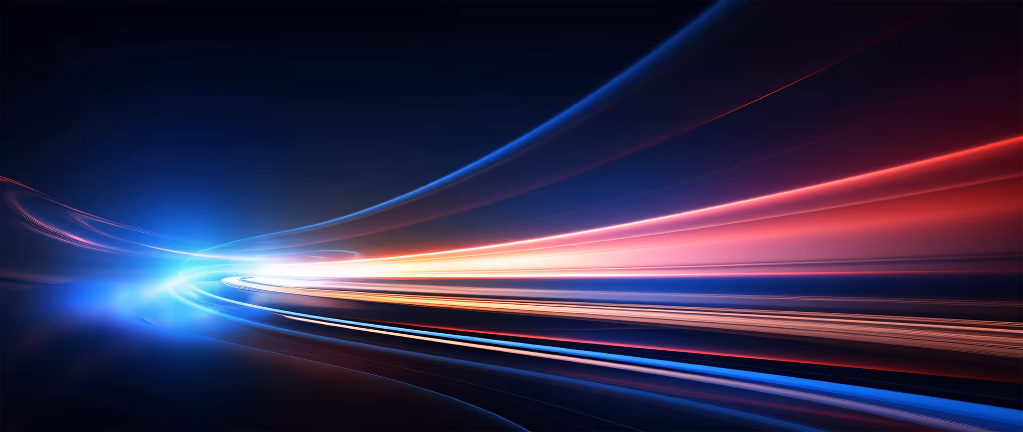 Abstract light trails in blue and red creating a dynamic, futuristic motion effect on a dark background.