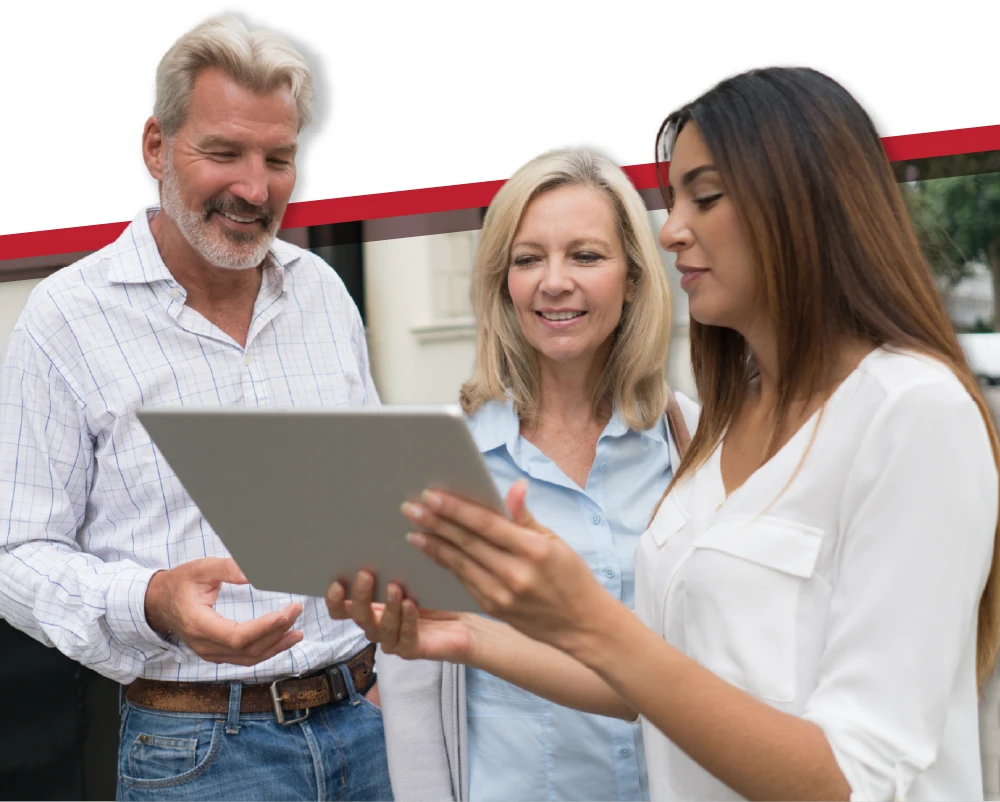 Older couple reviewing their insurance options from a Chabert Insurance of Hammond agent