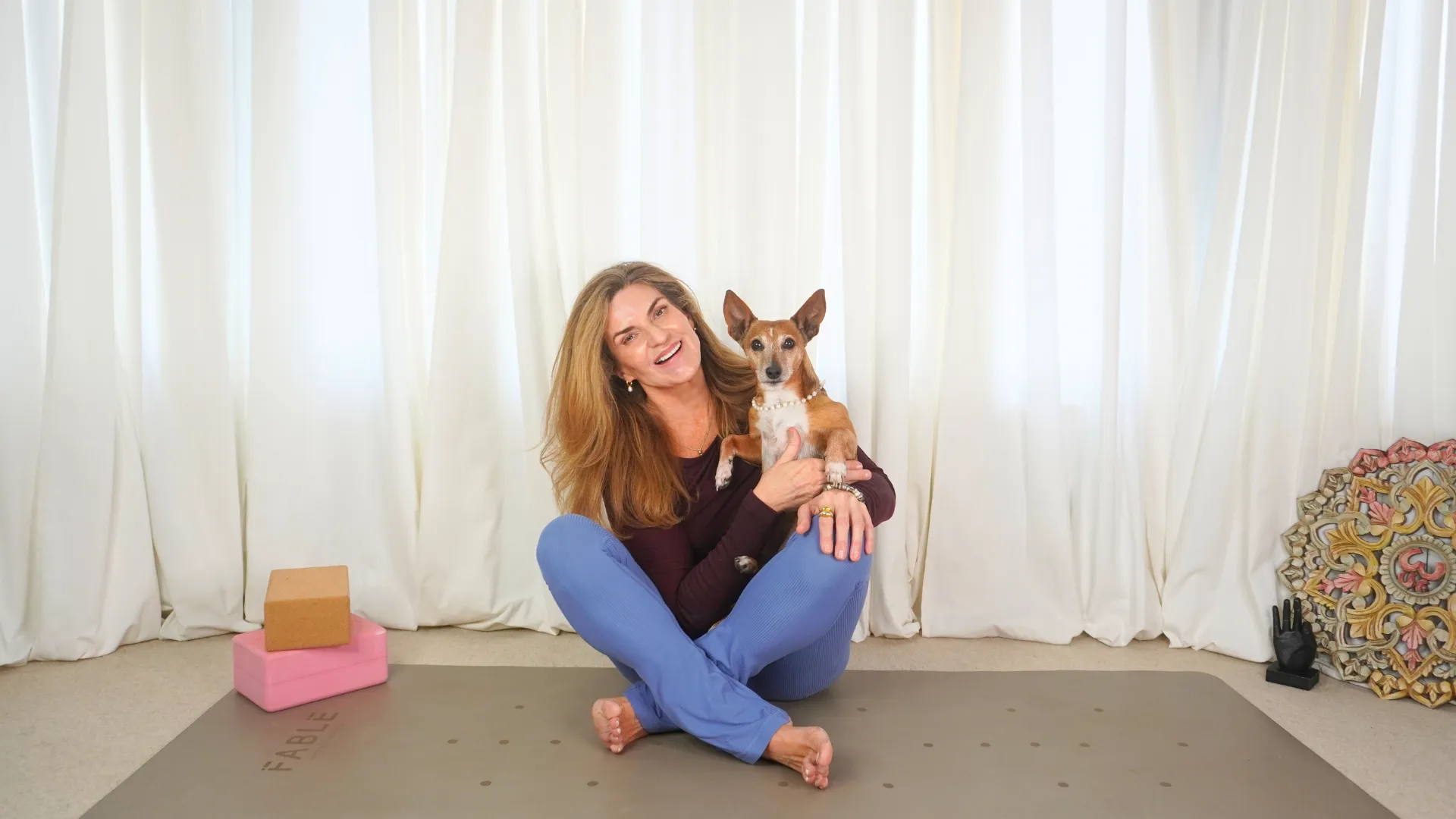 Jo Macarthur Mallorca Yoga Retreat 2025 profille image with small cute dog