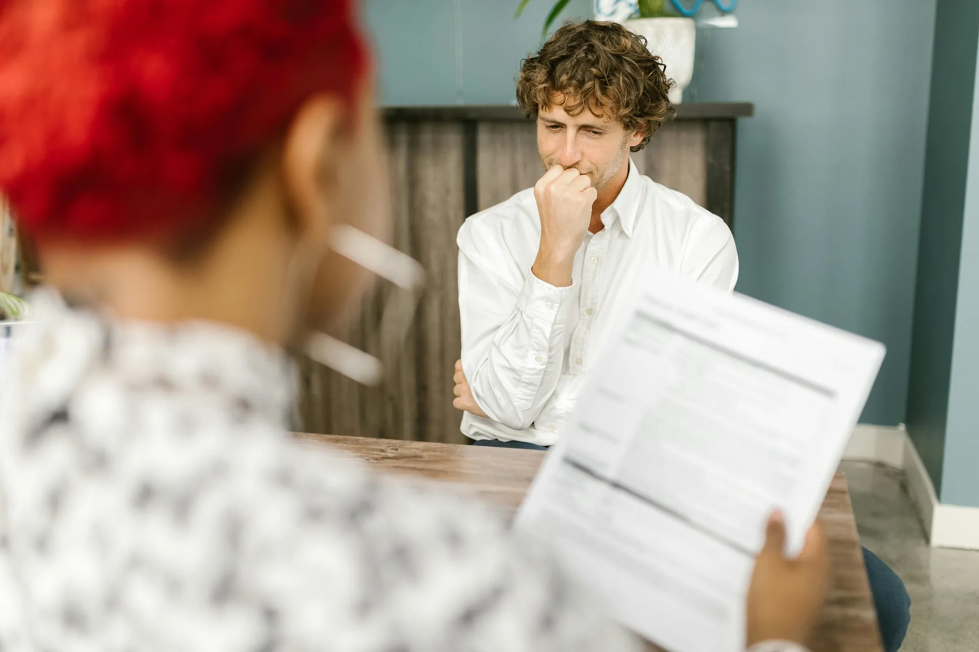 Business meeting representing hiring employees in the United Kingdom.
