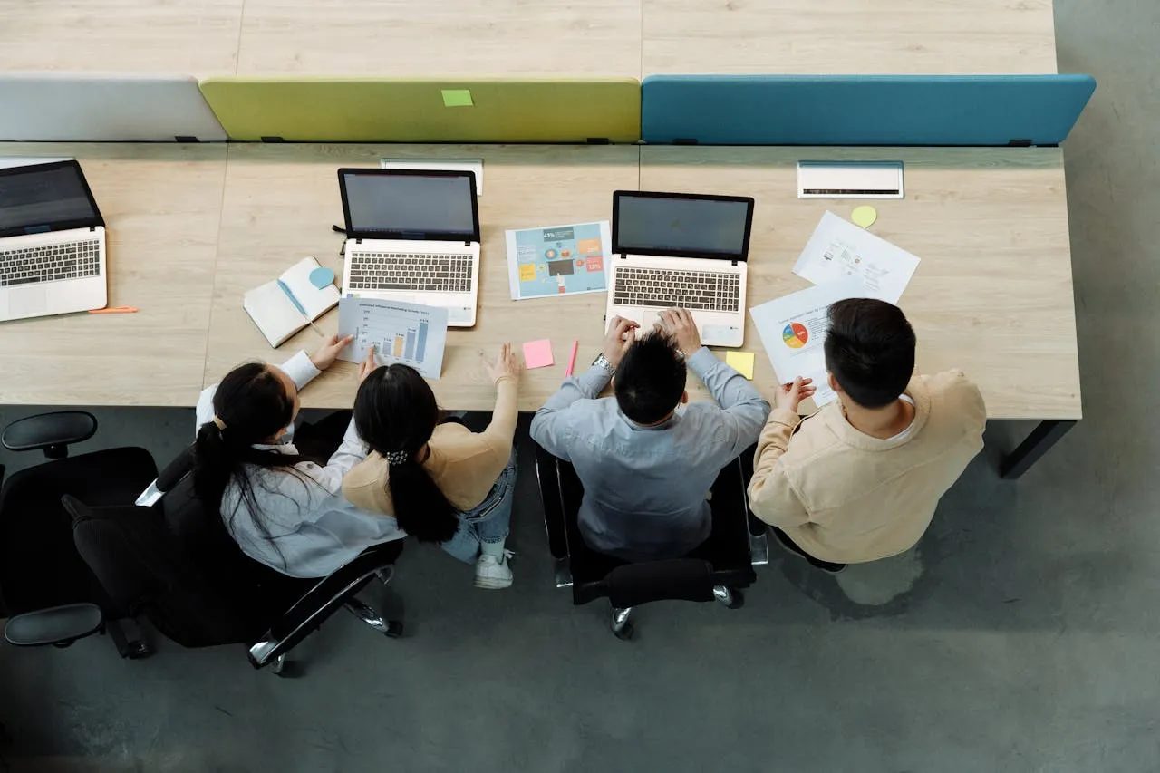 Remote team members collaborating to build trust across offshore teams.