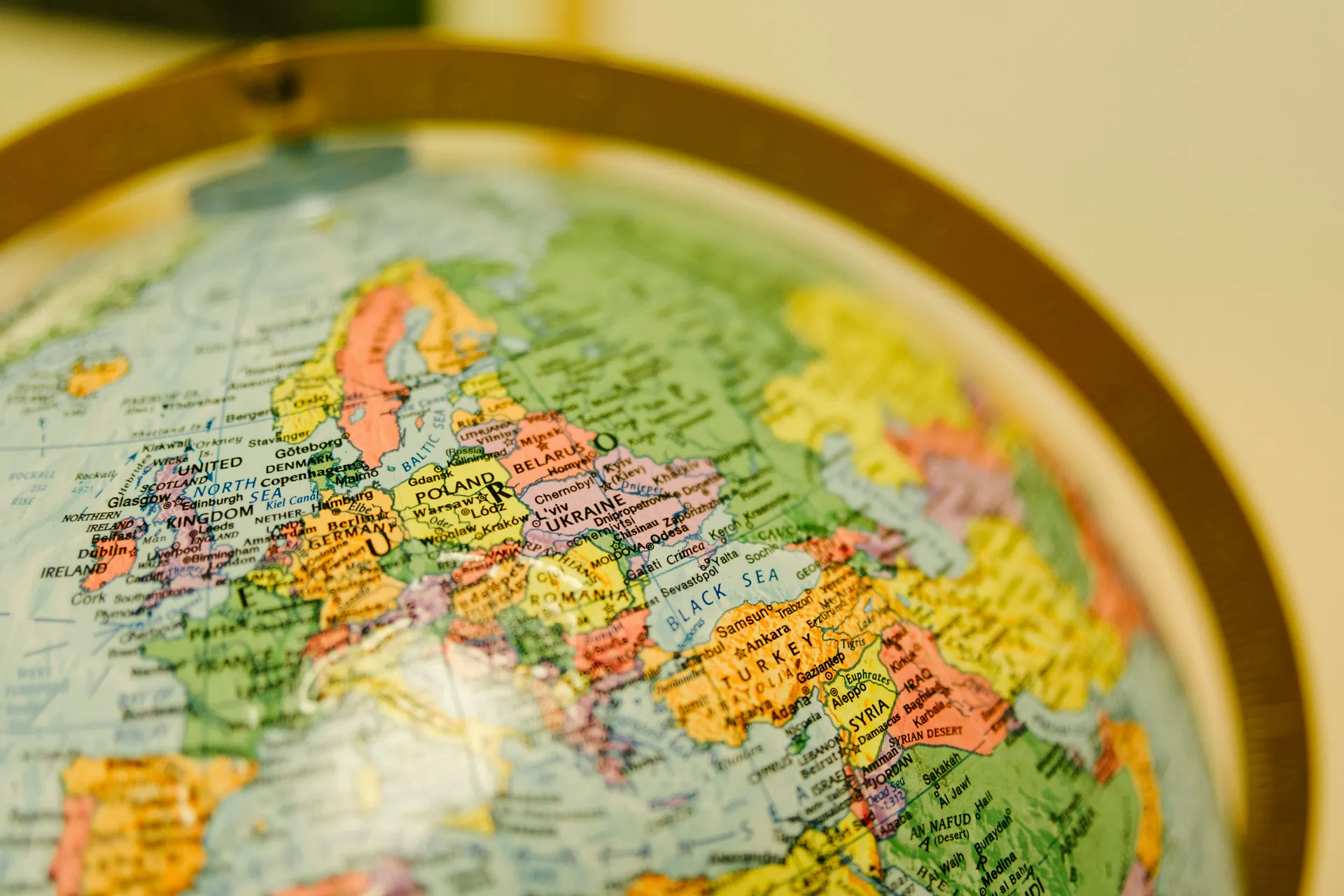 Close-up of a globe showing Europe, including countries like Germany, Poland, and Ukraine