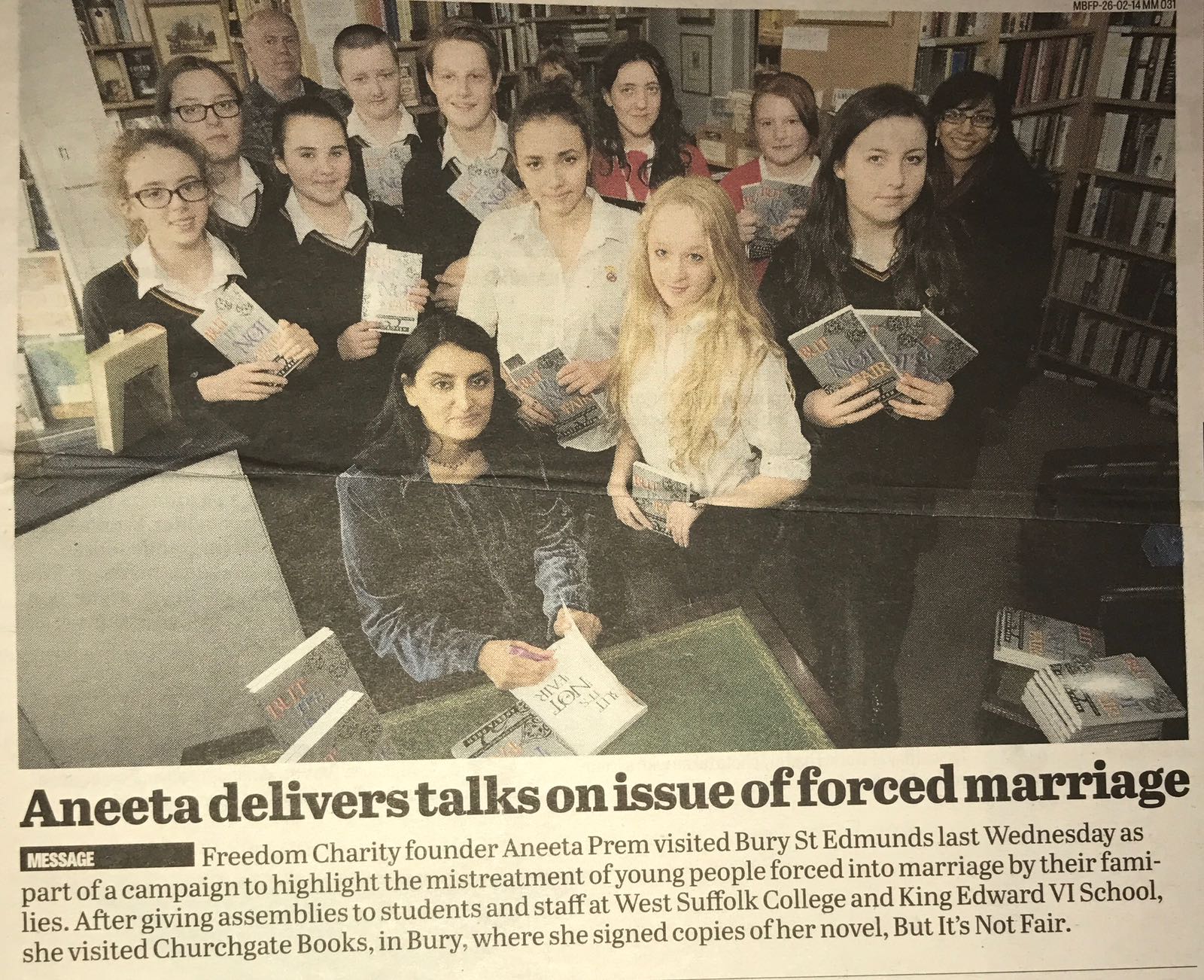 Local press cutting showing Aneeta Prem at Churchgate Books in Bury St Edmunds after forced-marriage talks at West Suffolk College and King Edward VI School.