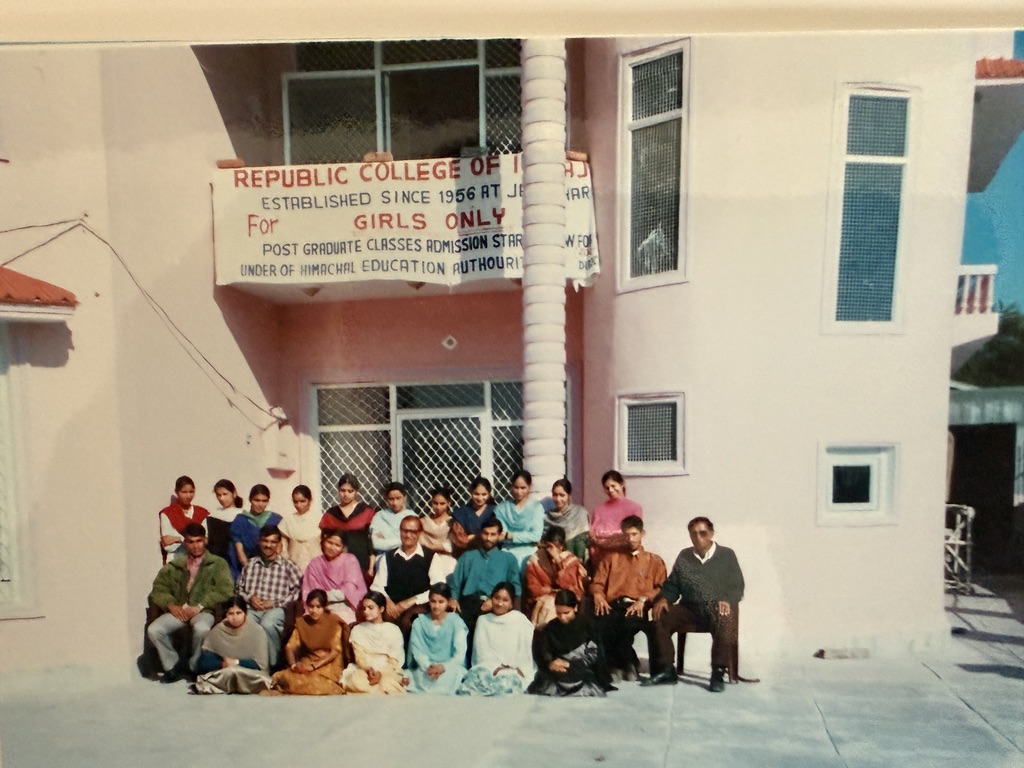 Historic family photograph showing students and staff gathered outside the Republic College of India at Jahu.