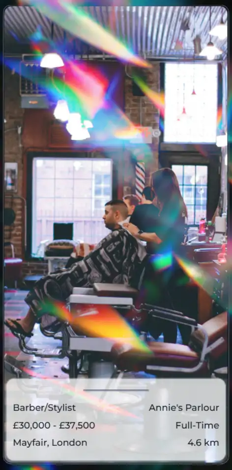 An Avantisea in-app job card - includes image of workplace/the team, salary, job title, company name, position type, flexibility, location, and distance. Barber/Stylist in Mayfair, London