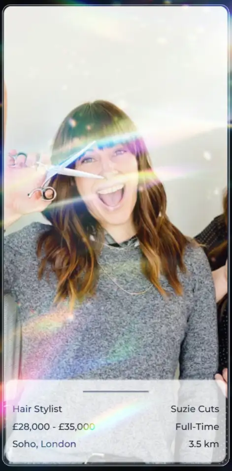 An Avantisea in-app job card - includes image of workplace/the team, salary, job title, company name, position type, flexibility, location, and distance. Hair Stylist job in Soho, London