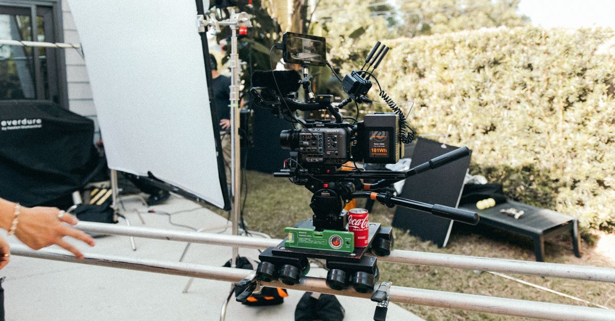 Detailed setup of a camera rig on a film set, showcasing gear and lighting in use.