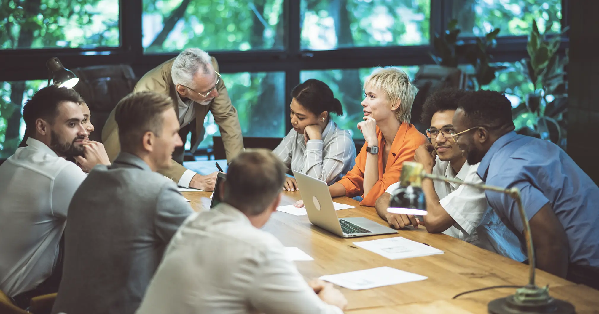 GhostFleet team collaborating at a conference table
