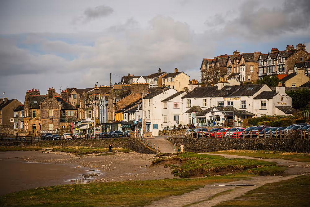 beach with houses in the background