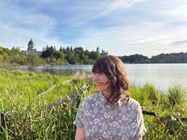 Photo of Lara Wesen with Olympia, WA in the background.
