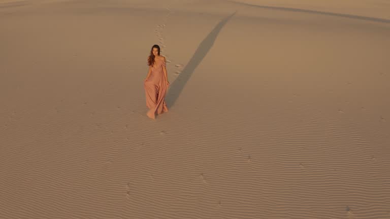 woman in the dessert on vacation