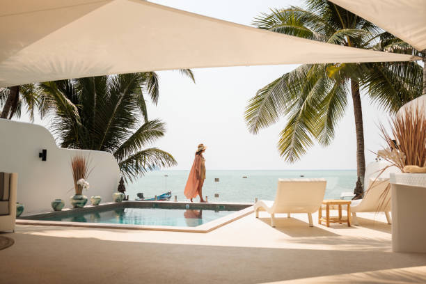 woman enjoying a luxury vacation on the beach