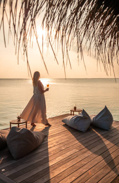 woman on a dock by the ocean