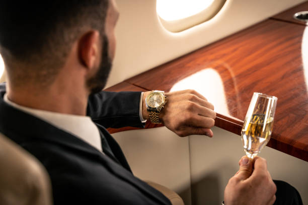 man on a private jet using curated escapes by meagan's add-on vacation services