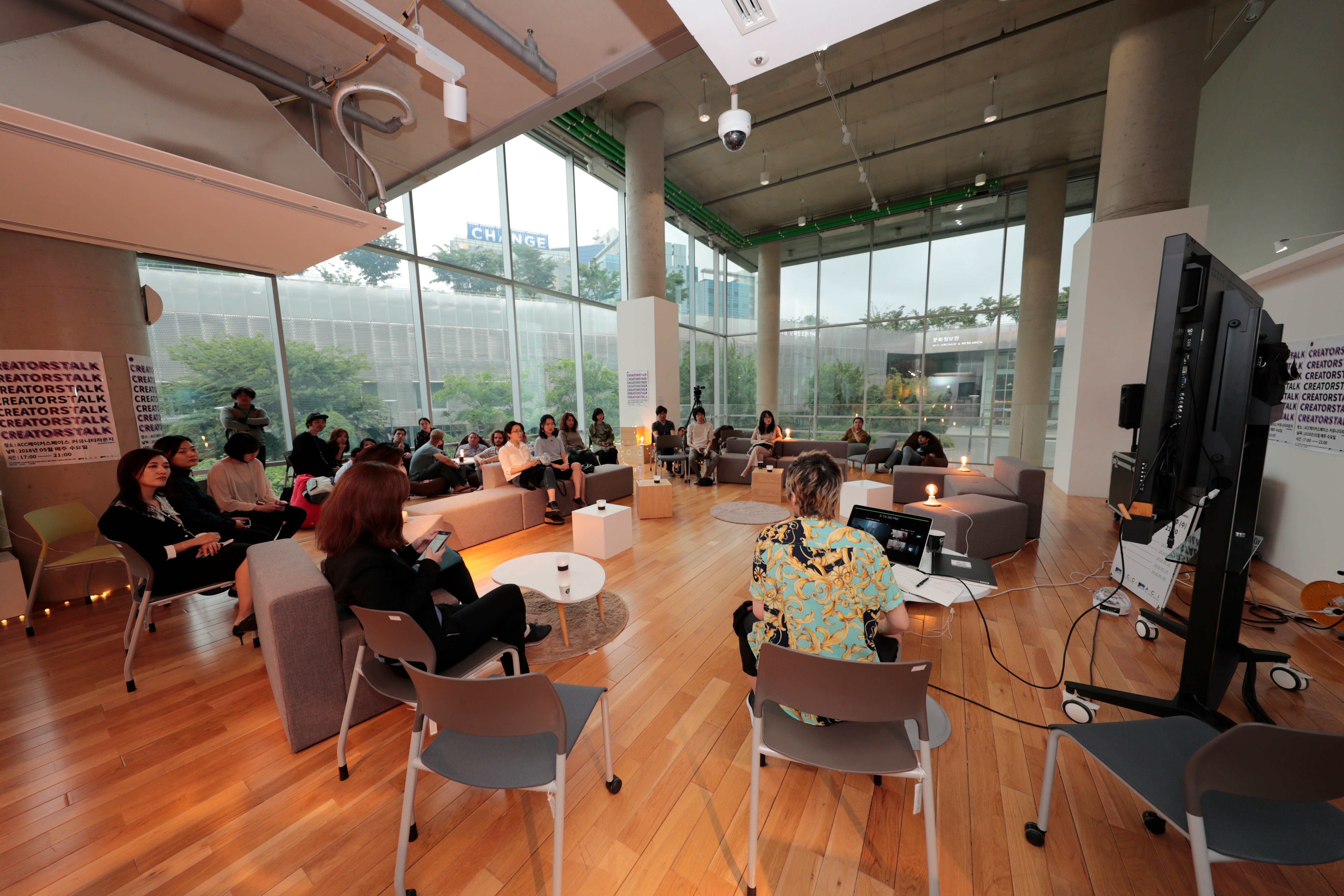 Image of team workshop taking place at a corporate office building