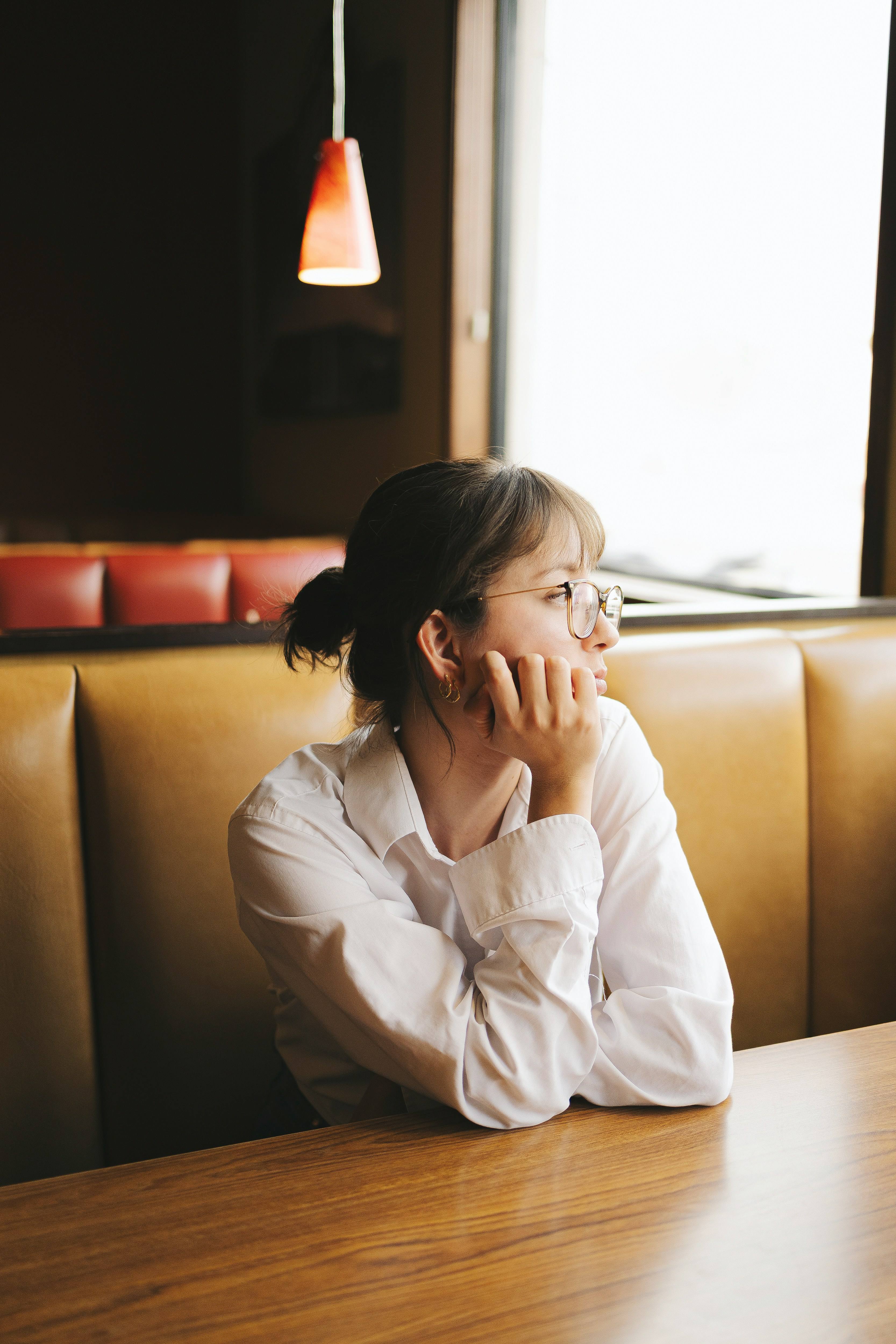 Woman sitting in diner near Mellow's West LA office