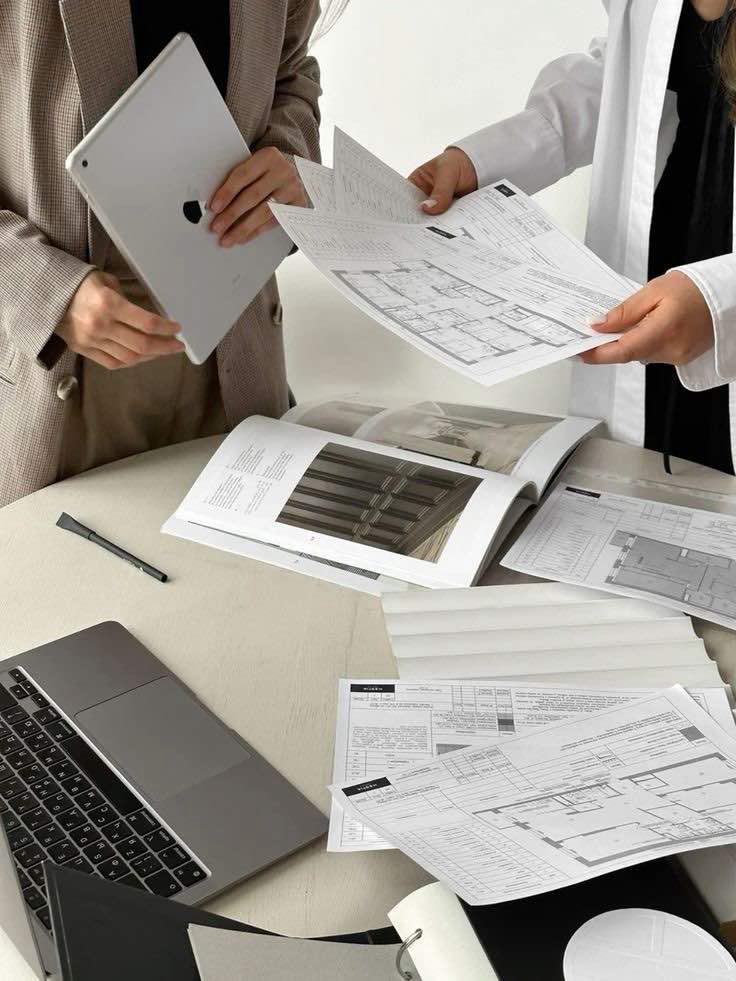 [background image] image of architectural plans (for a construction company)