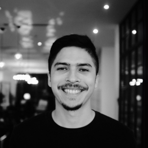 A photo in black and white of Omar Guerra the acting director of Almaraya Studio