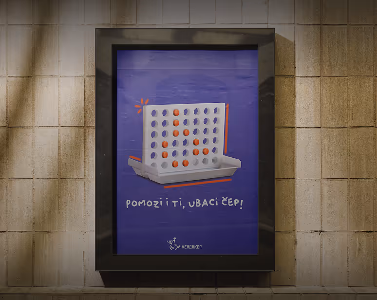 Framed poster on tiled wall showing a Connect Four game with red and blue pieces and the text 'Pomozi i ti, ubaci čep!' in Serbian.