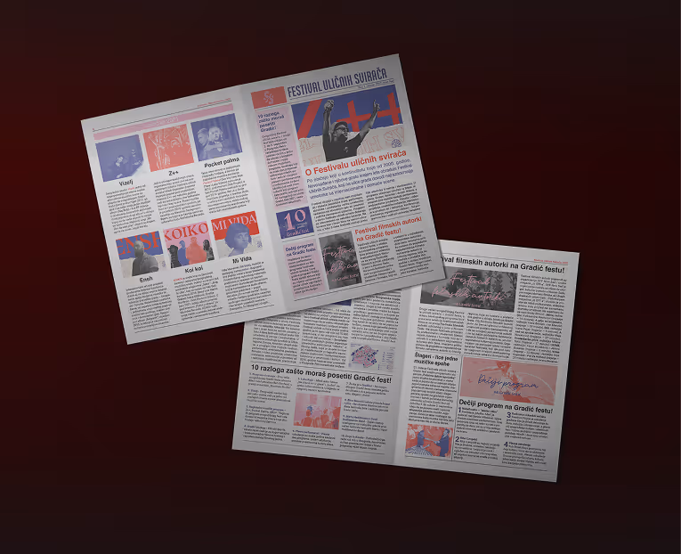 Two open newspaper pages with articles and images, featuring content about a festival and various topics in a foreign language.