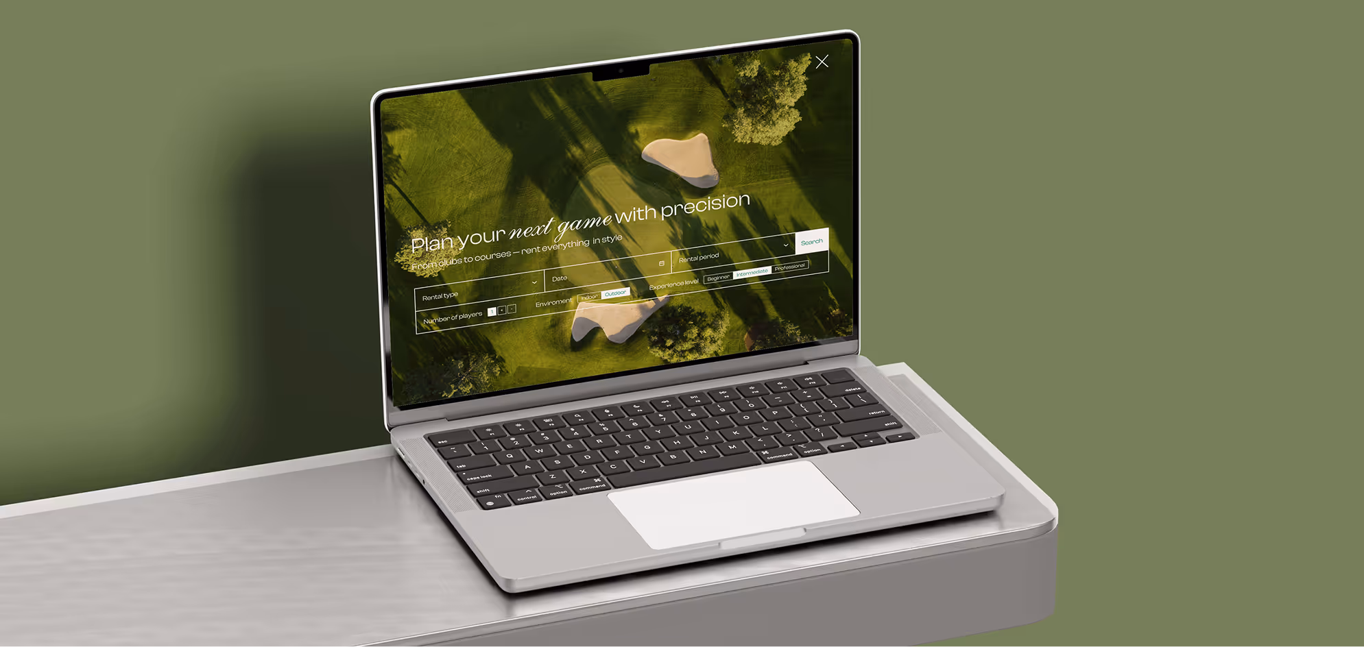 Open laptop on a gray table displaying a golf course planner interface with options to select rental type, date, period, environment, and experience level.