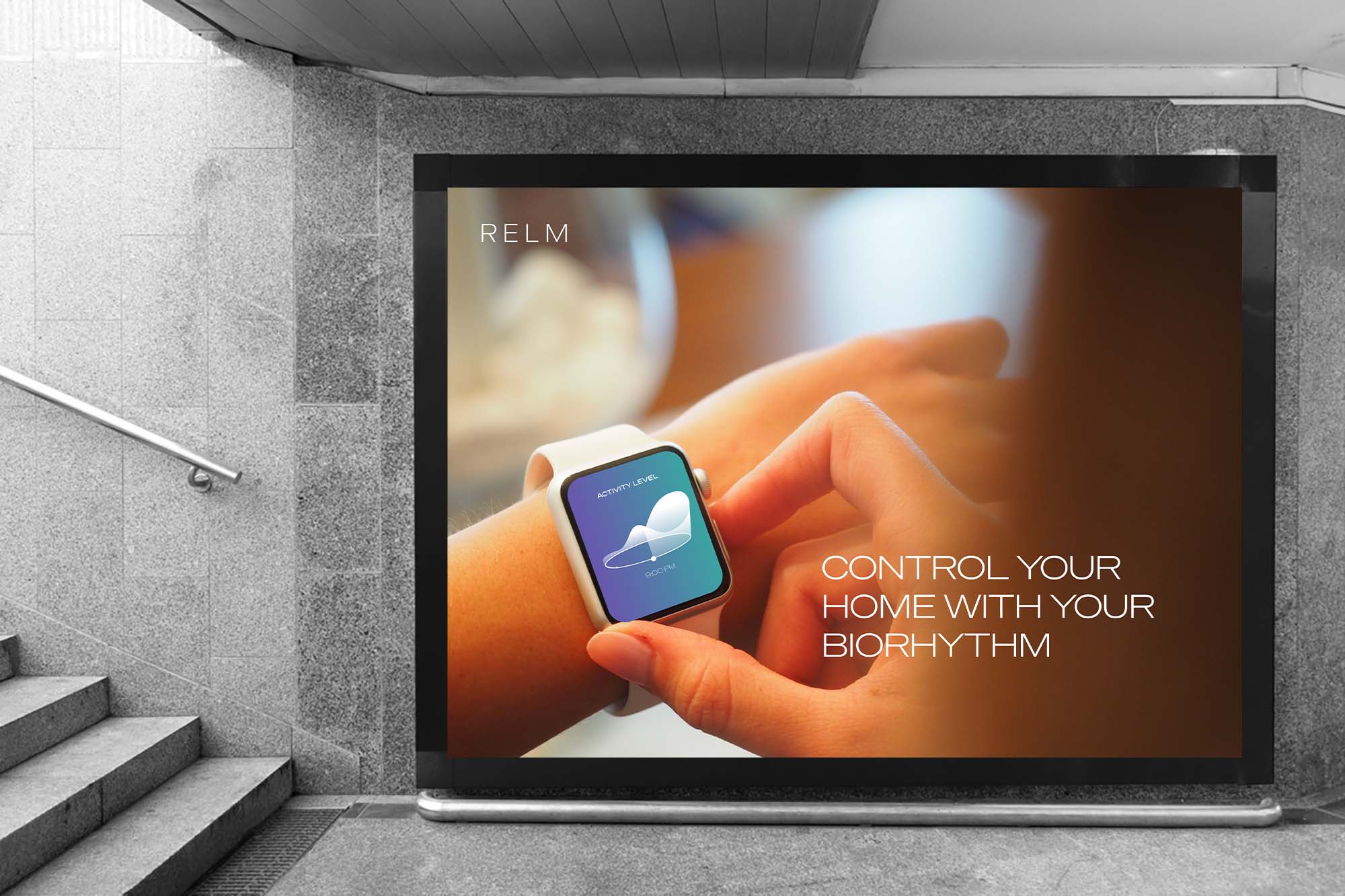 A Relm billboard advertisement showing a person controlling their Relm wearable app. The ad reads, "Control your home with your biorhythm"