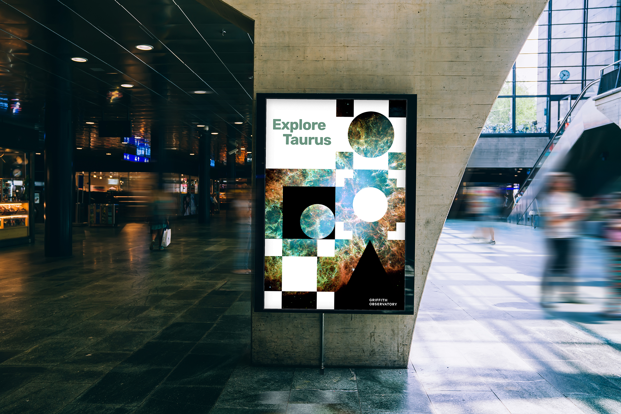 Image of a Griffith Observatory poster in an airport. The symbols show outer space imagery and the text reads "Explore Taurus"