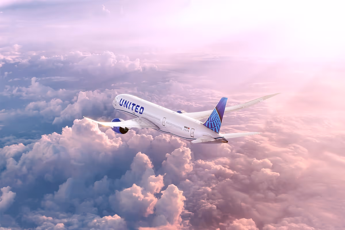 United airline plane in the clouds