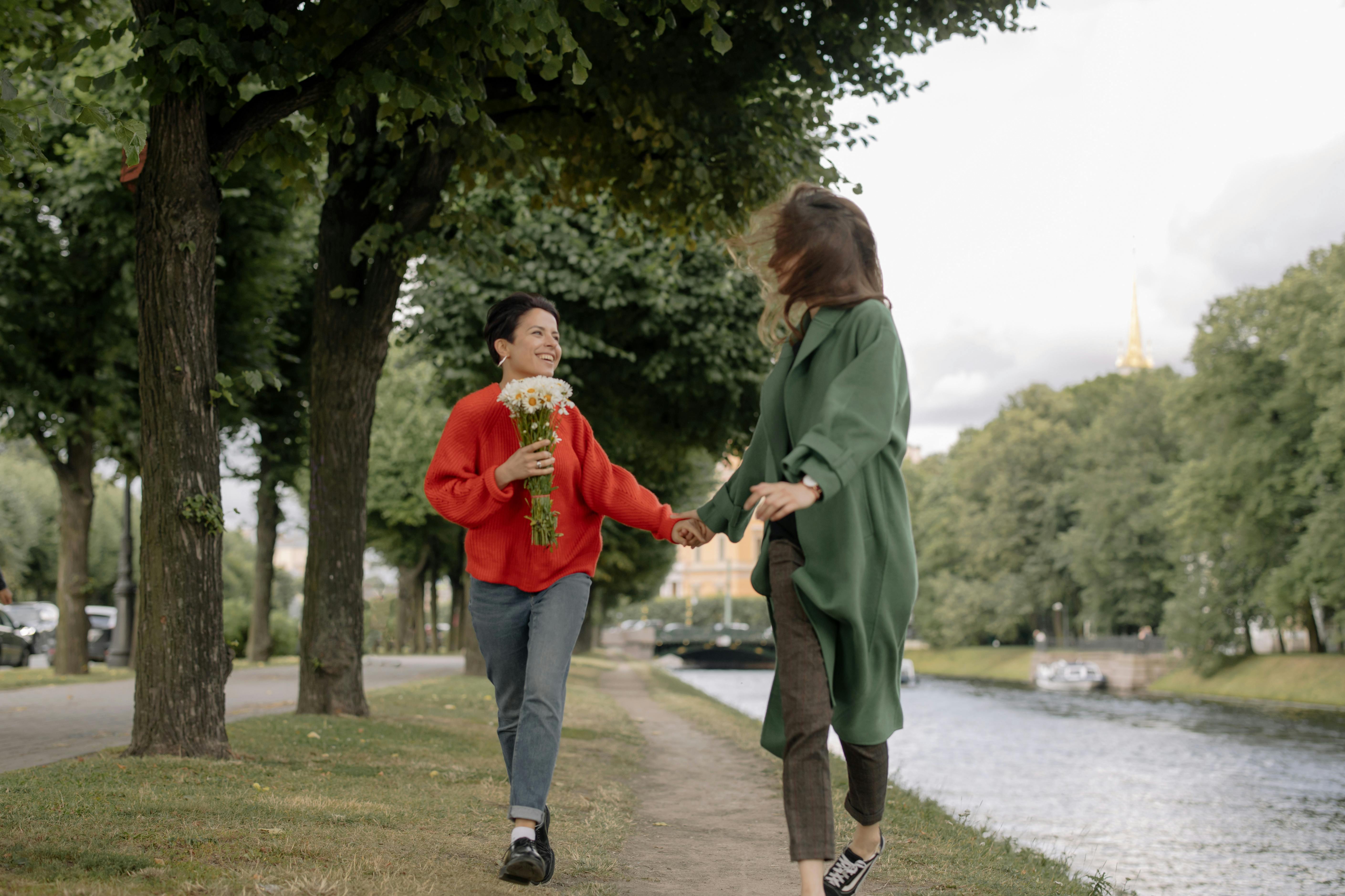 A couple holding each other while walking