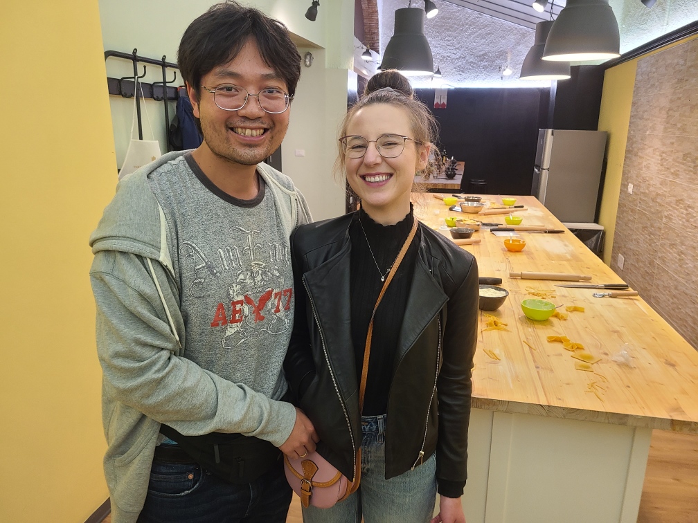 Mari-Alina Timoshchuk and Cassidy Sung standing next to each other in a pasta making class in Florence Italy
