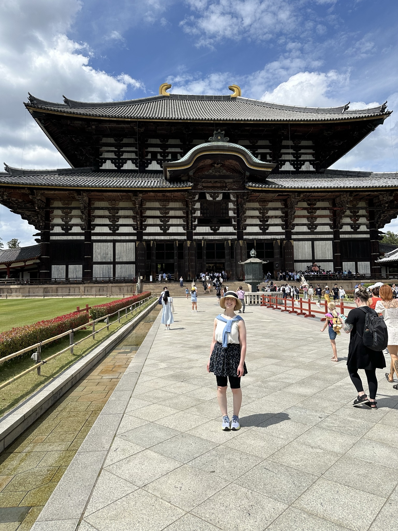 Mari-Alina Timoshchuk in front of Toda-ji Buddhist temple in Nara Japan