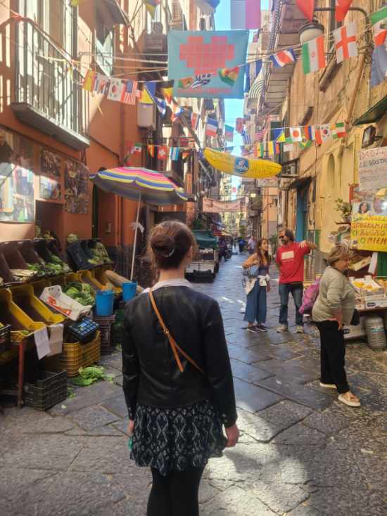 Mari-Alina Timoshchuk walking in the streets of Naples Italy