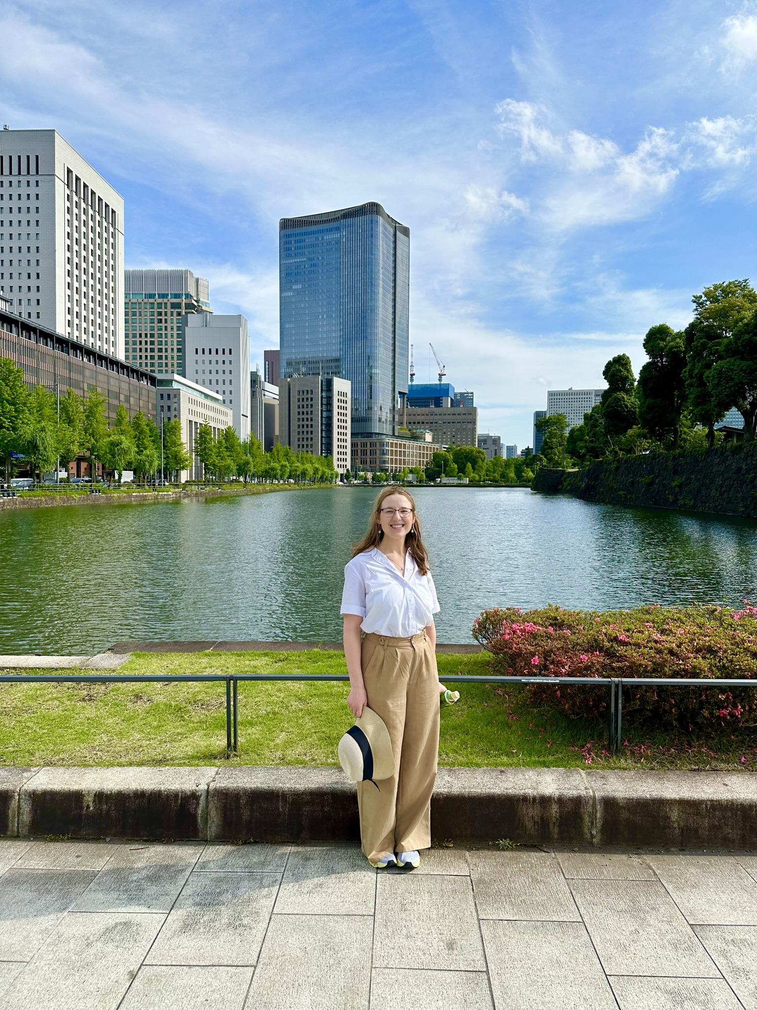 Mari-Alina Timoshchuk next to a man made lake in Tokyo Japan 